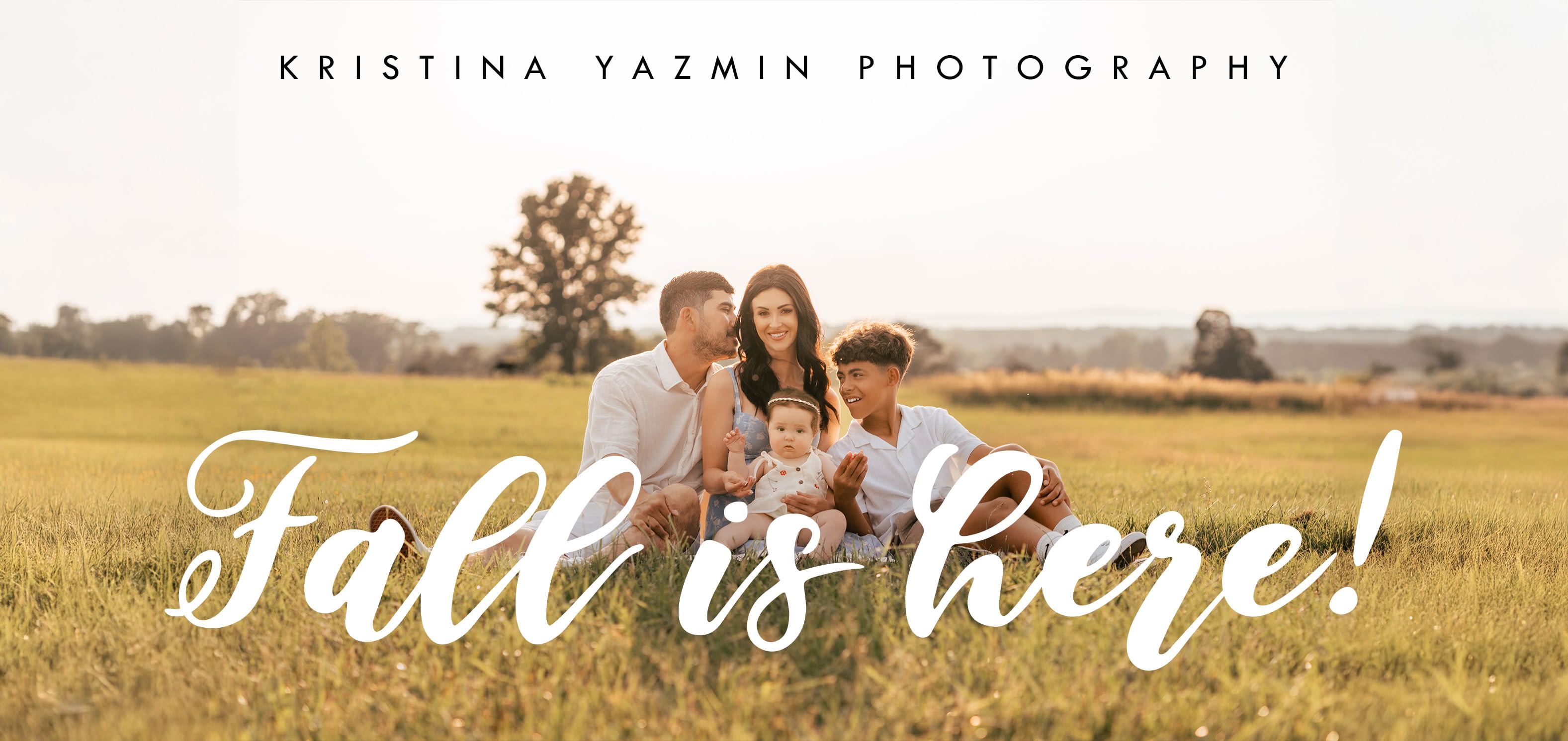 Photo of a family sitting in a field at Manassas National Battlefield Park in Manassas, Virginia.